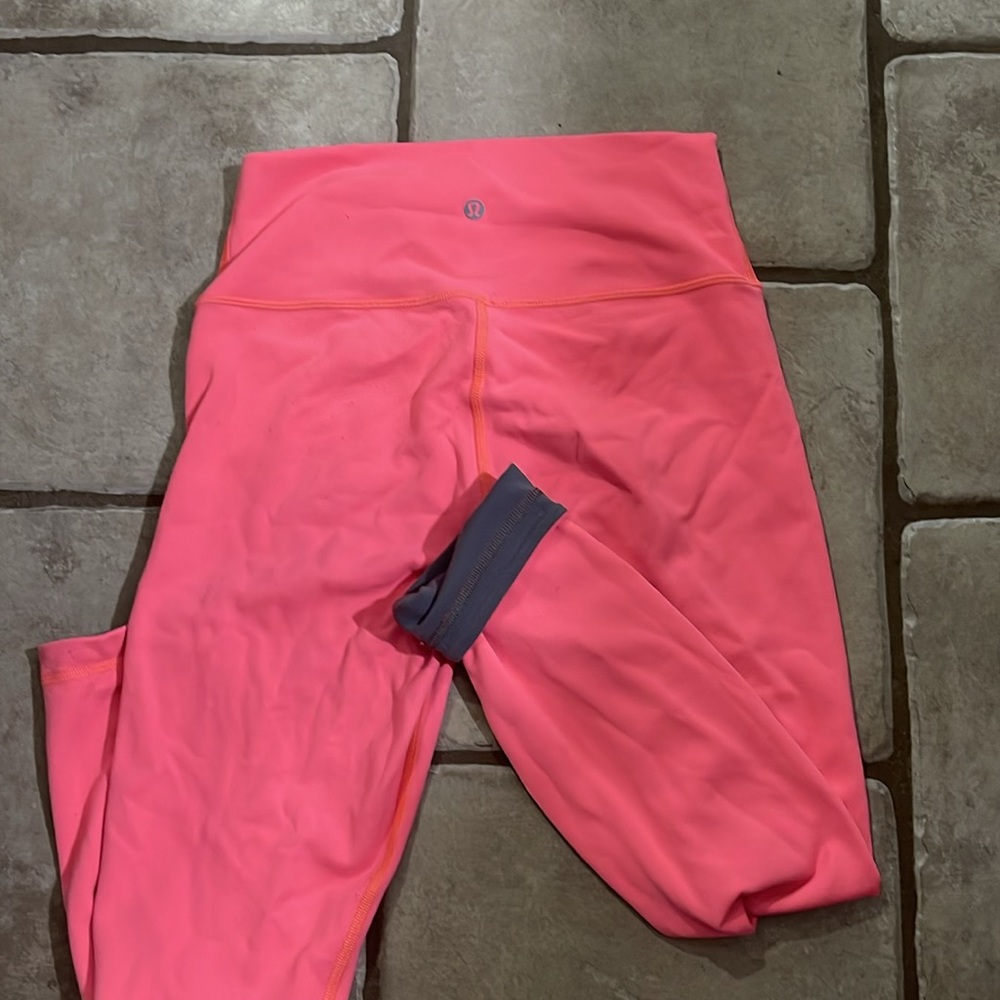 Size 8 bright pink lululemon leggings.